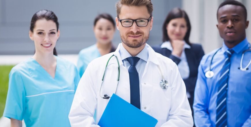 team-doctors-standing-together-hospital-premises (1)